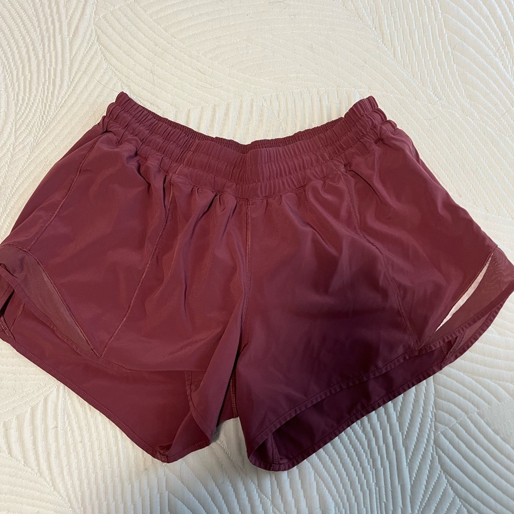 Pink lululemon hotty toddy shorts size 10